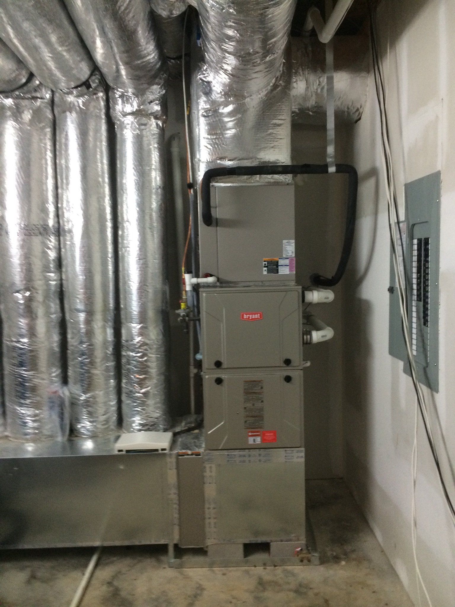 A heating unit in a basement