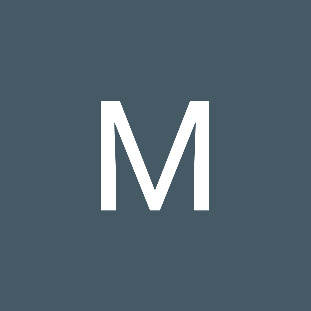 A white letter m is on a blue background.