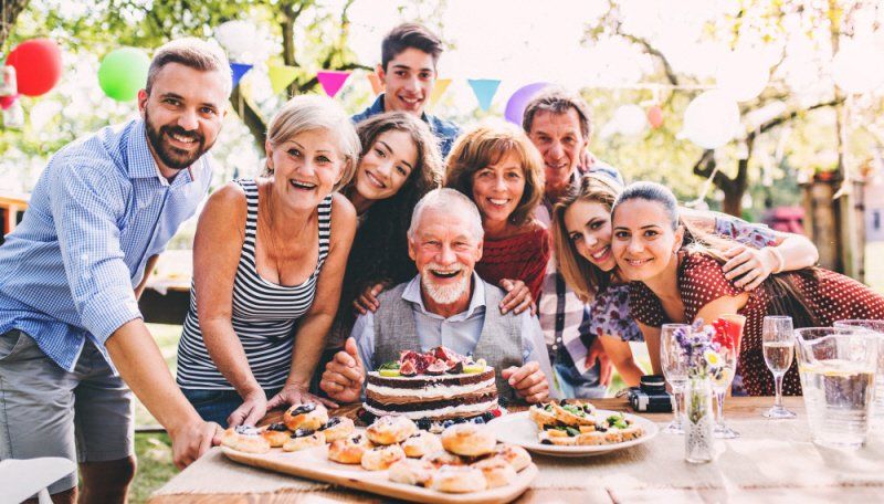 Adult group celebrating a birthday party