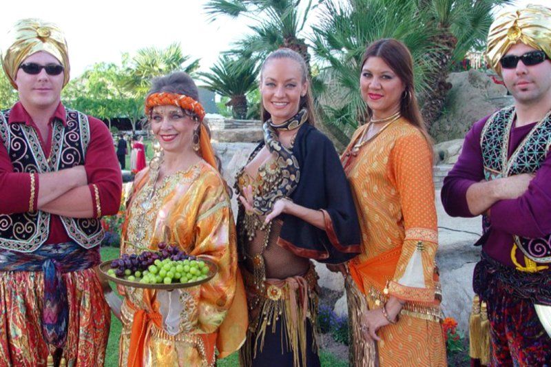 Student events graduation Arabian nights theme showing several attendees dressing in costume
