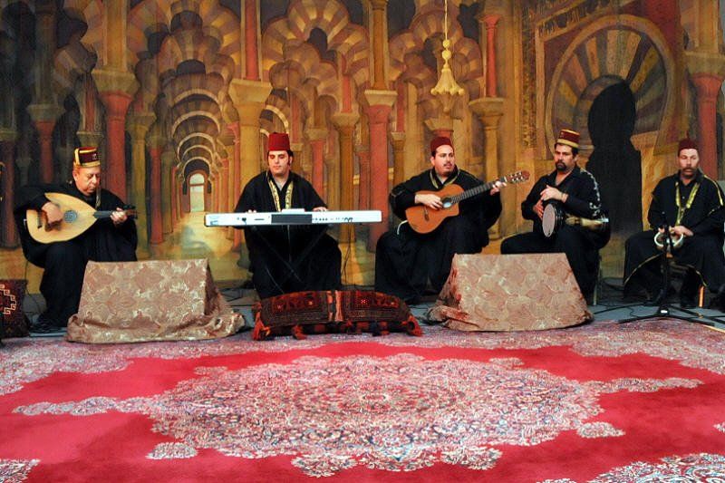 Band and DJs image showing an Arabic live musical performance