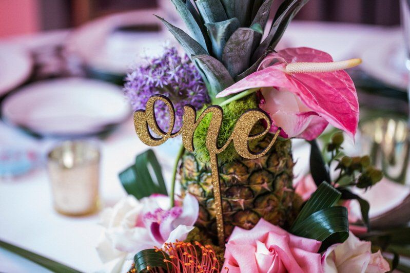 Wedding celebration Hawaiian styled pineapple floral centerpiece