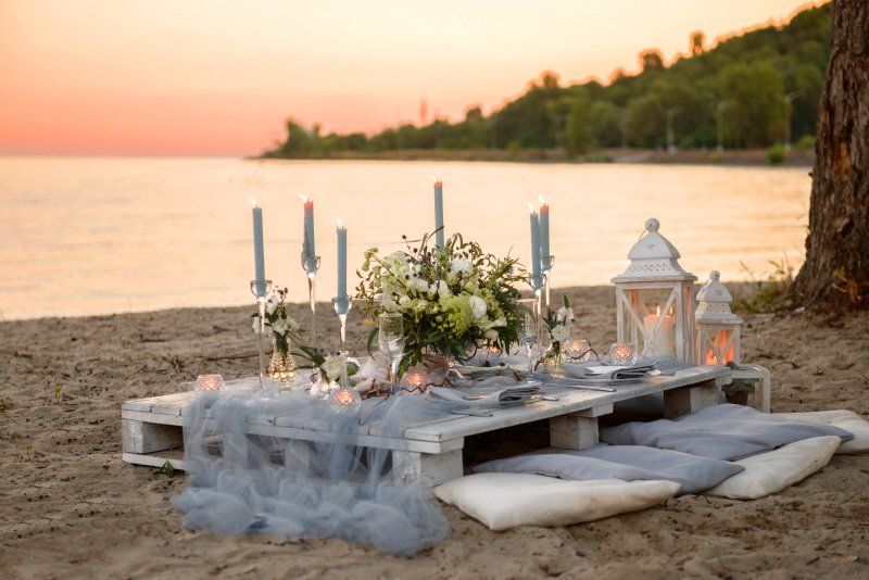 Wedding celebration tropical styled table setting on the beach