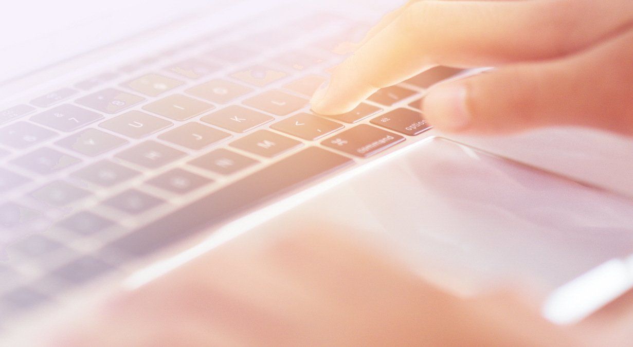 Typing on laptop