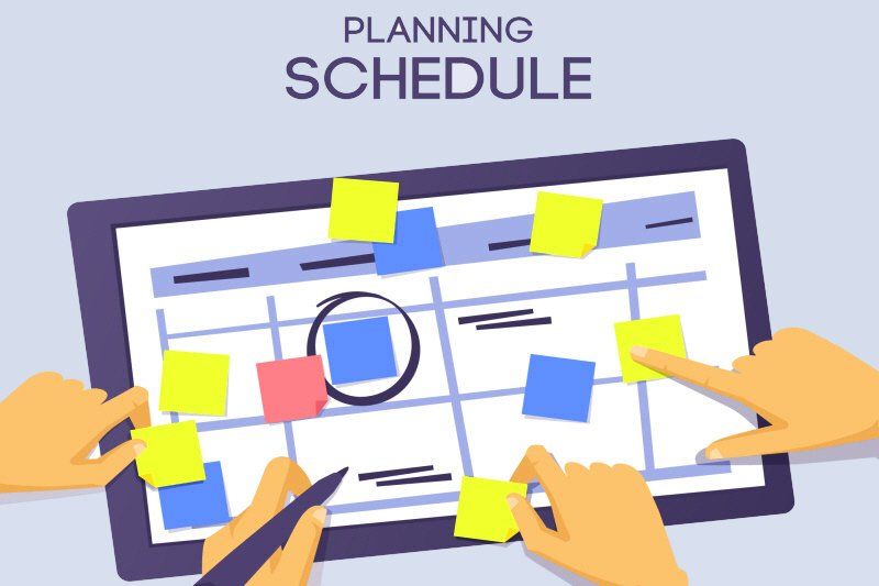 a person is planning their schedule on a tablet
