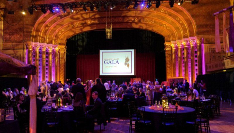 Image showing a wide view of a fund raising event with group attending event