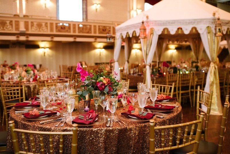 Wedding celebration Moroccan styled table setting and canopy stage setup