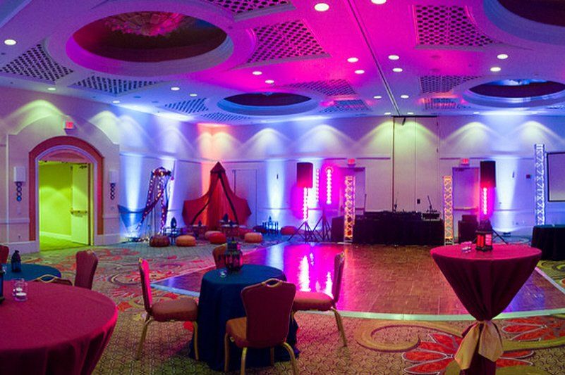 Wedding celebration Indian Sangeet styled room decor and table settings
