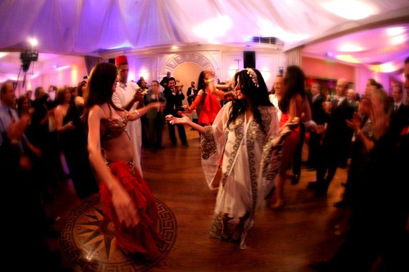 Wedding celebration with guests dancing during Jewish Henna party