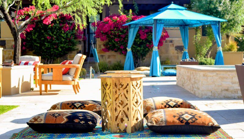 Low wooden tables with floor cushions