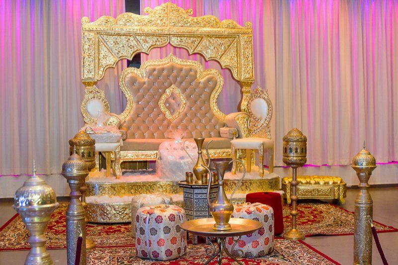 Wedding celebration Moroccan styled golden decor seating arrangement