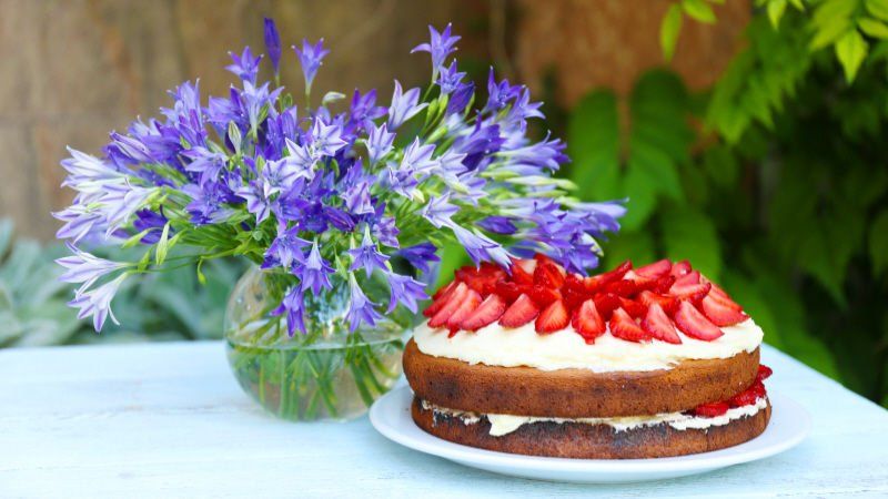 Picnic Poolside Dessert with a floral arrangement