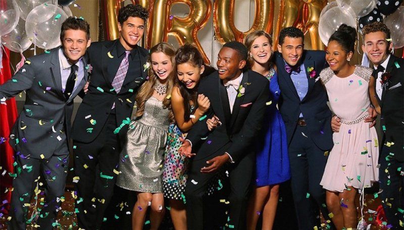 Well dressed students celebrating at an event
