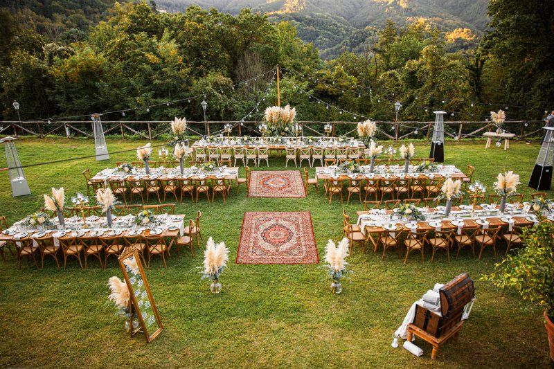 Wedding celebration rustic styled outdoor ceremony seating arrangement
