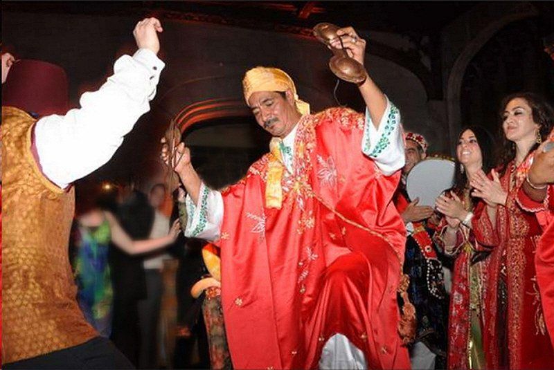 Strolling entertainment image showing dancing musicians in costume