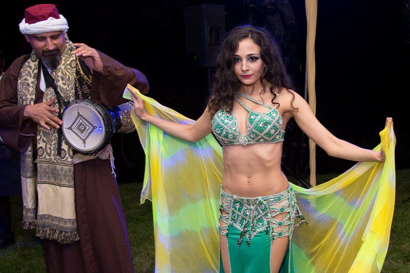Adult Social Event Moroccan theme with strolling drummer and belly dancer