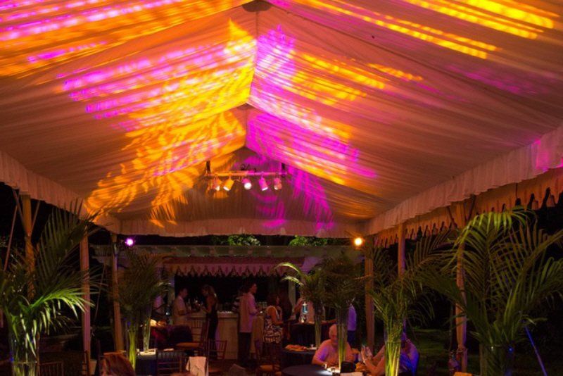 Adult Social Event with colorful tent ceiling lighting design