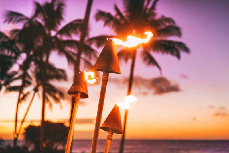 Tiki Torches at Hawaiian Theme Party