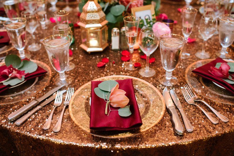 Wedding celebration Arabian styled table setting with lamp and flowers