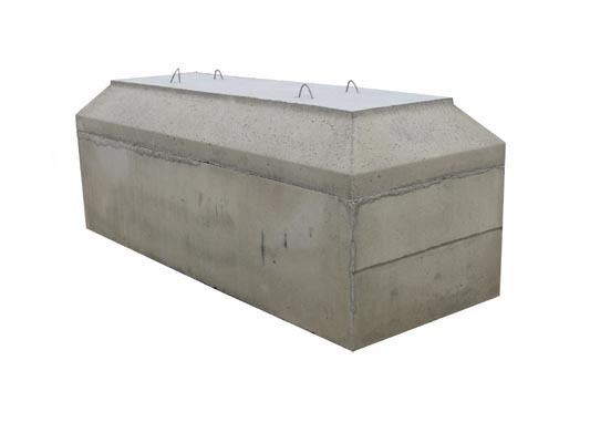 Concrete rectangular burial vault with a flat, sloped lid and metal handles.