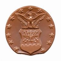 Chocolate coin featuring an Air Force emblem with an eagle, shield, and stars.