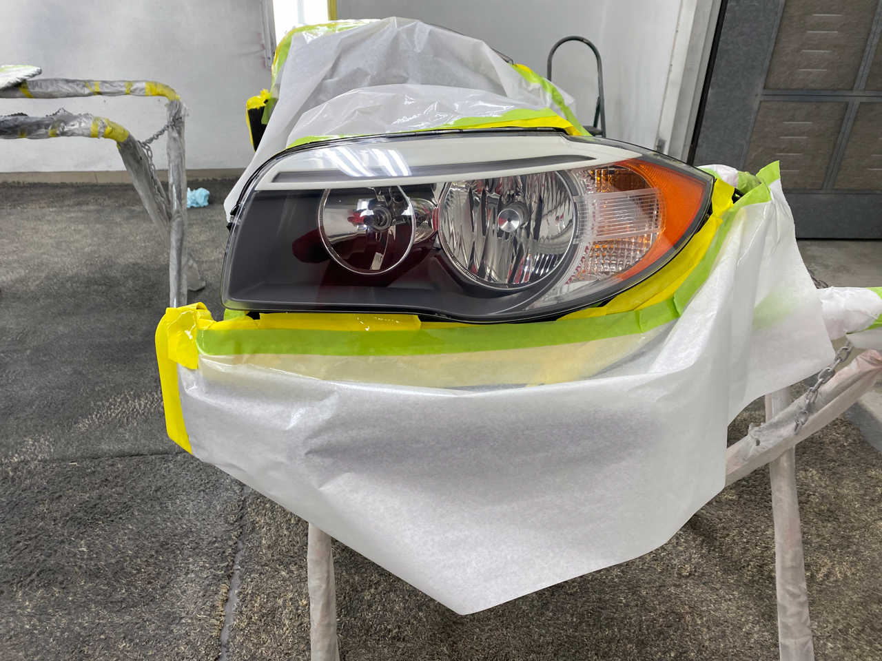 Lutz's Garage Repairing a Headlight for a Vehicle in Jefferson City, MO.