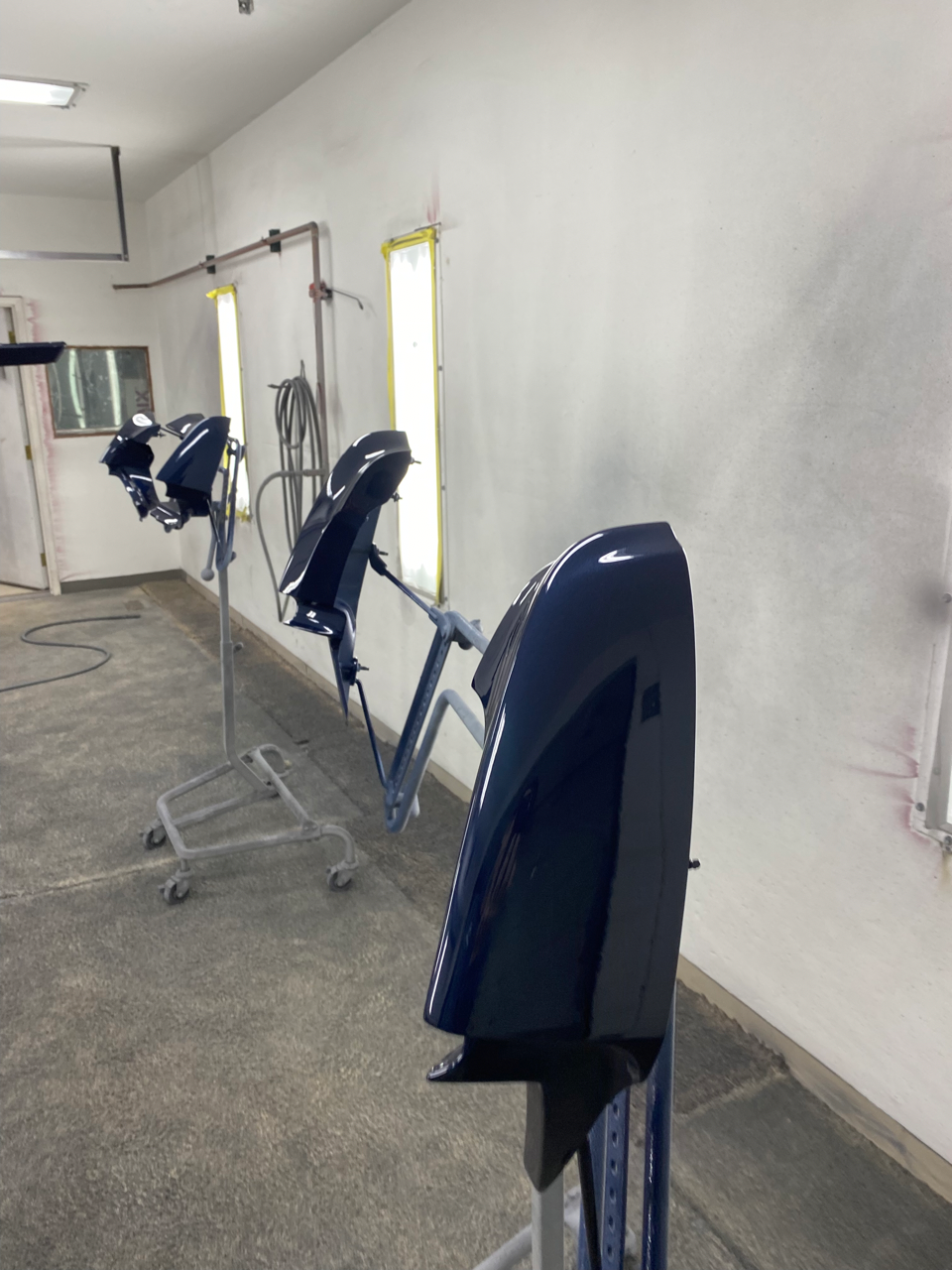 Four Navy Blue Vehicle Panels, Painted By Lutz's Garage, an Auto Body Shop in Jefferson City, MO.