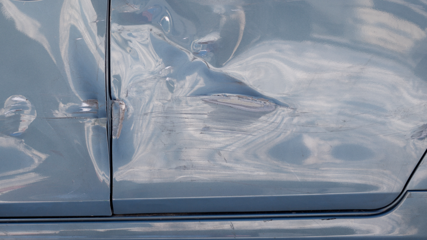 Remove Imperfections From Your Vehicle & Call Lutz's Garage for Dent Repair in Mid-MO