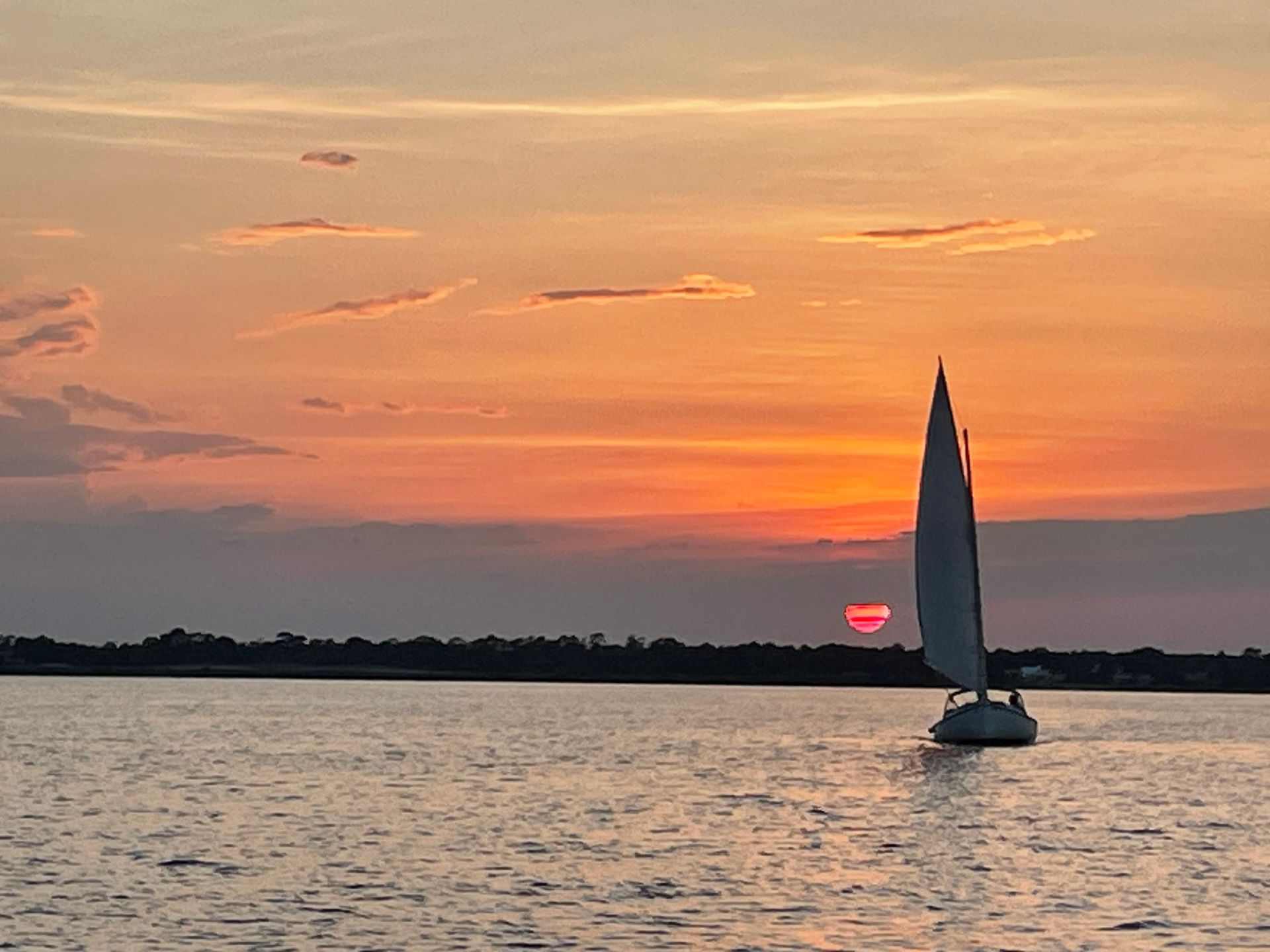 Sailing in downtown Stuart on the water at sunset from Port St. Lucie