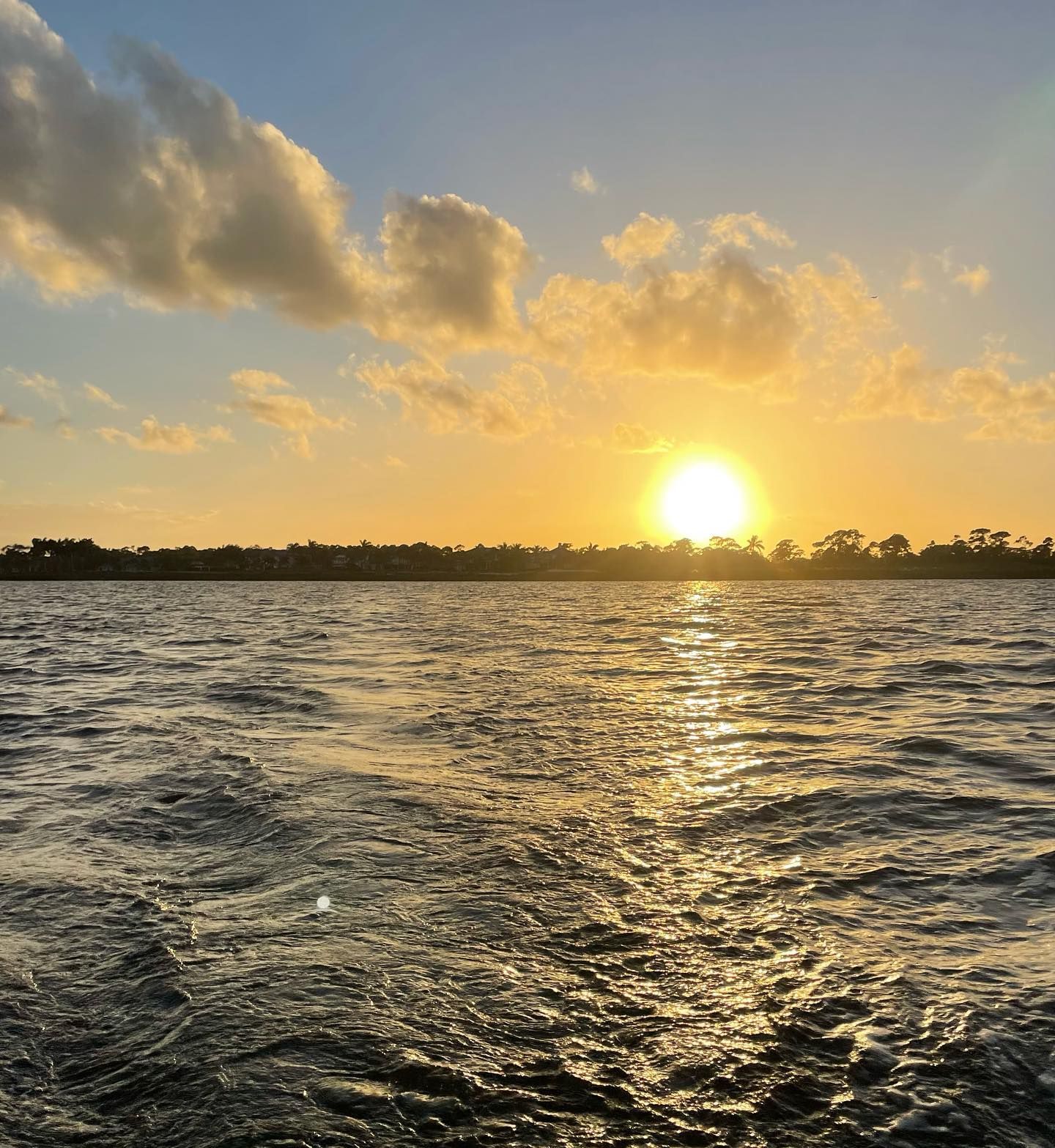 The sun setiing on the St. Lucie River Estuary