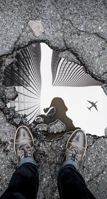 We’ll provide you the foot and ankle treatment needed to get back to your life! feet next to a puddle