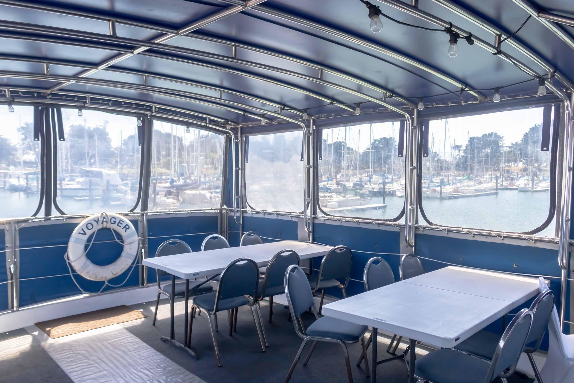 People on a boat toast with drinks against a sunset. People on a boat toast with drinks against a sunset.