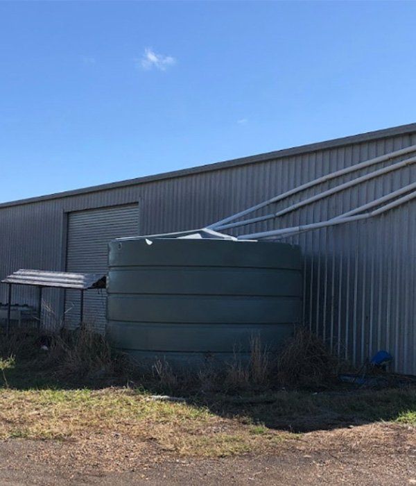 Storm Water Drain Into Water Tank — Ian Stanley Plumbing In Avoca, QLD