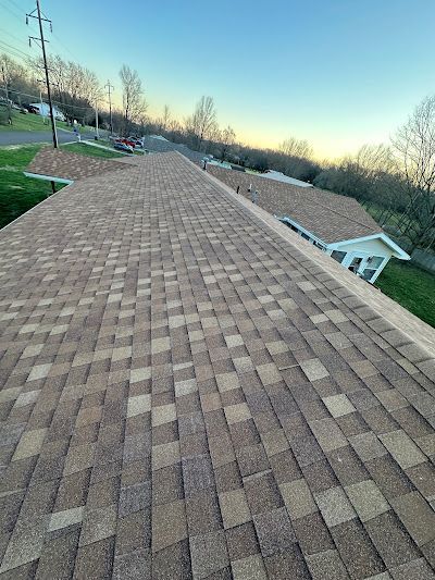 A close up of a roof with shingles on it.