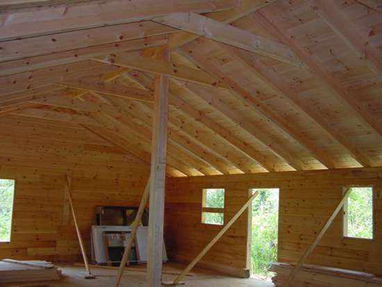 Interior of a wooden building under construction.