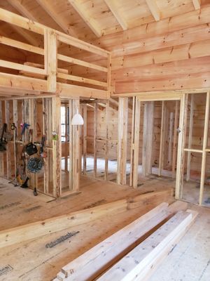 Interior of a wooden house under construction. 