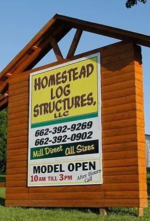 Sign for Homestead Log Structures, LLC. 