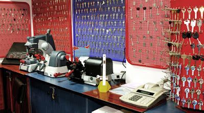 A room filled with lots of keys and a calculator.