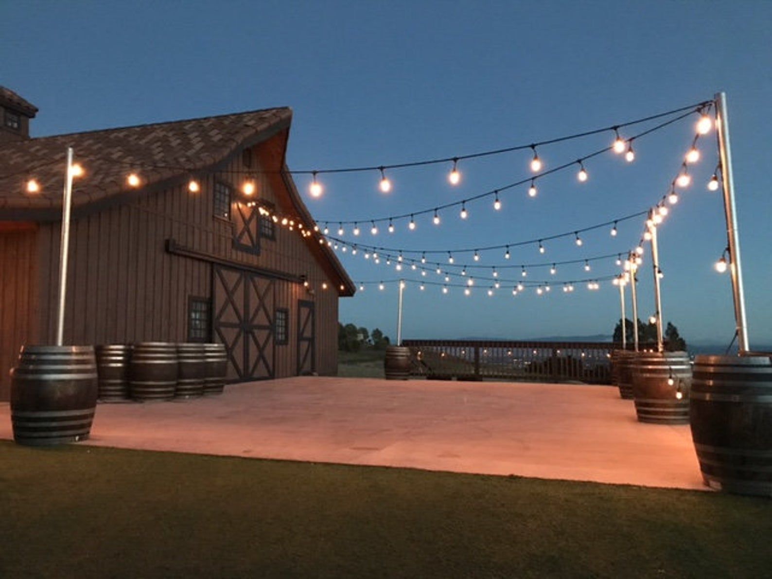 Backyard furniture light stands from Used Wine Barrels   from Napa Valley Wine Barrels call 714-767-1881