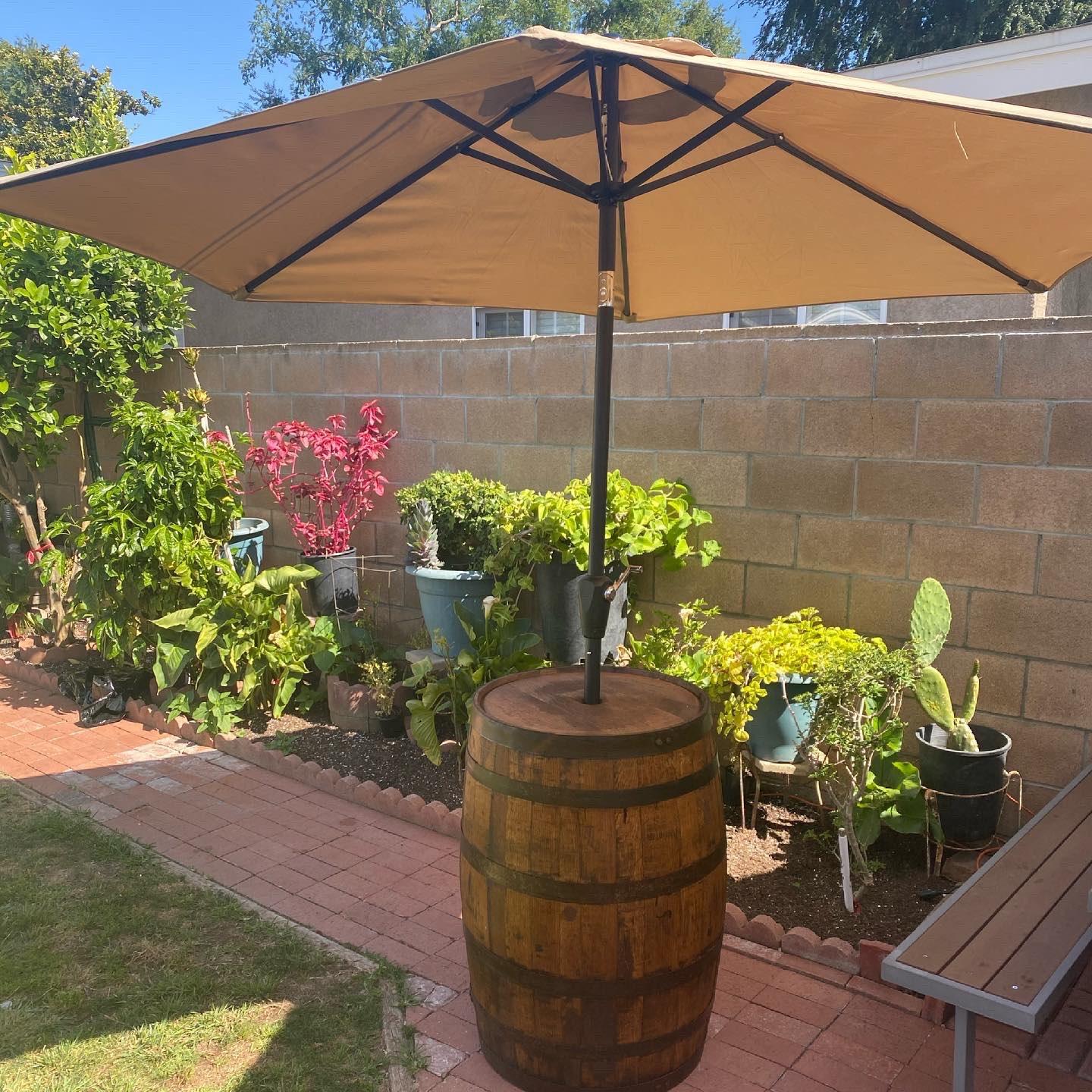 Used Wine Barrel umbrella stands from Napa Valley Wine Barrels call 714-767-1881