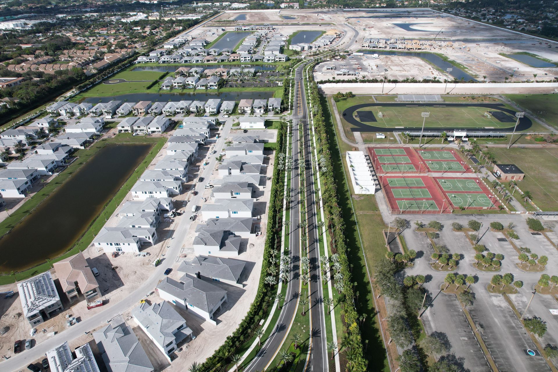 A building is being built with a lot of windows and a ladder in the background.