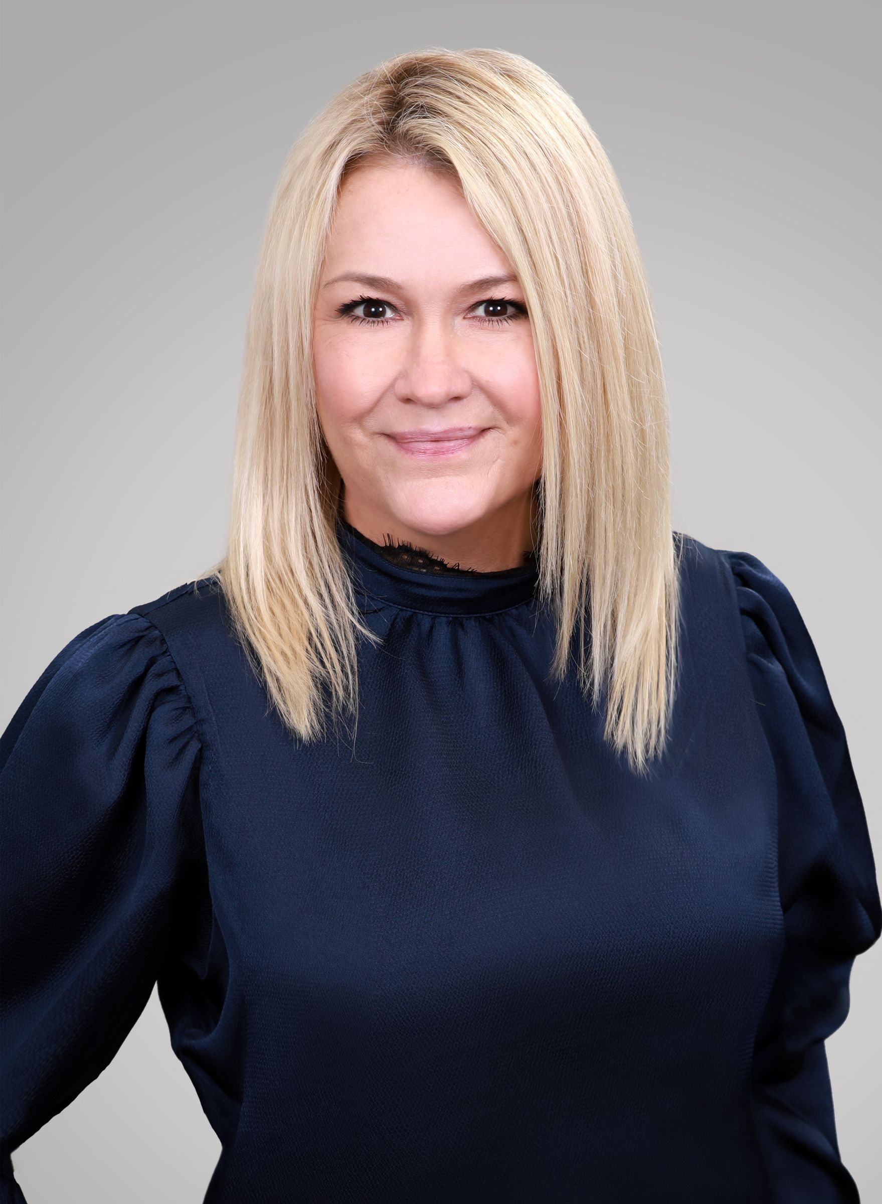 Jennifer Coffman Profile Picture, smiling at the camera