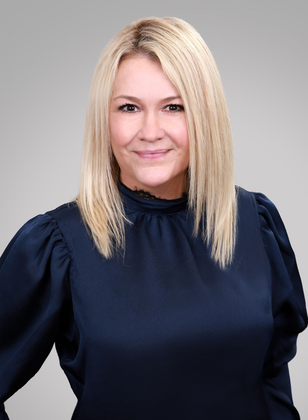 Jennifer Coffman Profile Picture, smiling at the camera