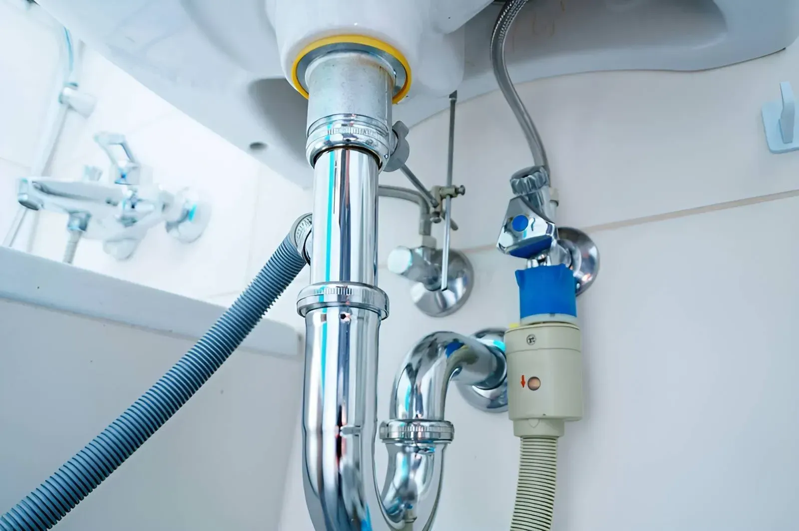 Featuring a P-Trap and Connected Water Supply Hoses — Dunnrite Plumbing Services in Proserpine, QLD