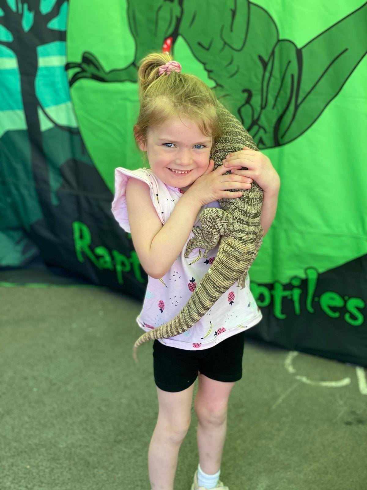 Little girl with animal