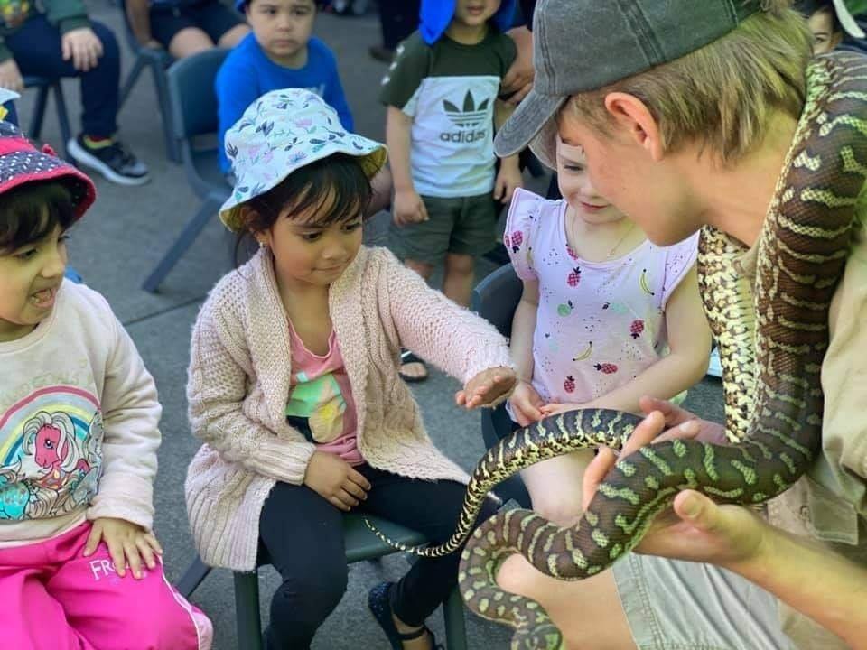 Little girl with snake