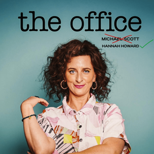 A poster for the office shows a woman with her arms crossed