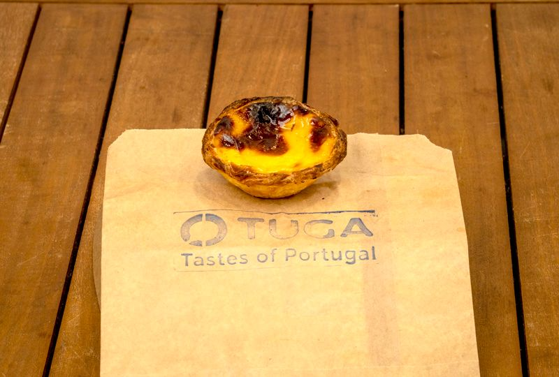 Portuguese Custard Tart on A Wooden Cutting Board — O Tuga Tastes Of Portugal In Melbourne, VIC