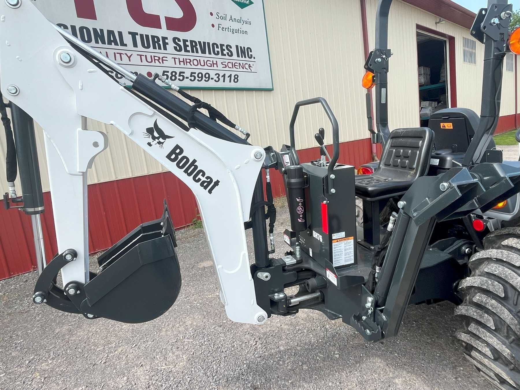 CT2035 with a backhoe
