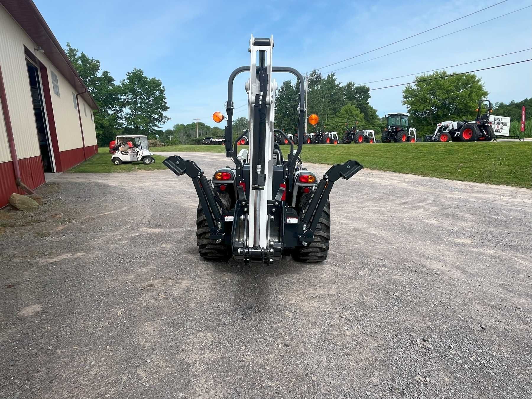 ct2035 with a backhoe
